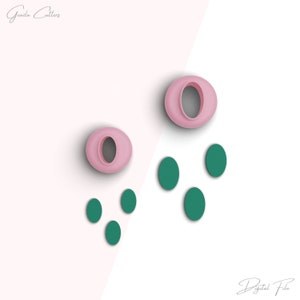 May include: Pink letter "O" cookie cutters and green oval-shaped cookie cutters on a white and pink background. The image includes the text "Gearla Cutters" and "Digital File".