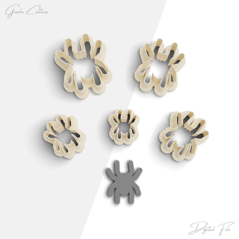 May include: Set of six cookie cutters in the shape of spiders. The cutters are beige and come in various sizes. There is also a single gray spider cookie cutter.