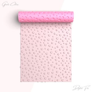 May include: A pink rolling pin with a textured surface featuring hearts, stars, and circles. The rolled portion is a darker pink, and the unrolled portion is a lighter pink. The words "Digital File" are in the bottom right corner.