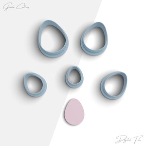 May include: Set of six blue plastic cookie cutters shaped like different sized eggs. The cutters are arranged on a white surface.  The text "Digital File" is at the bottom of the image.