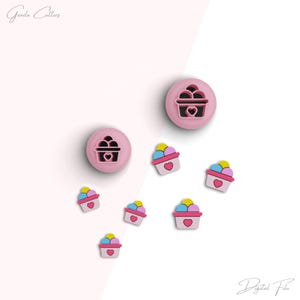 May include: A set of seven pink plastic cookie cutters shaped like ice cream cones with scoops of ice cream. The cutters are arranged on a white background. The text "Digital File" is visible in the bottom right corner of the image.