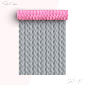 May include: A rolled-up pink textured mat with a gray, textured, unrolled section. The mat has a repeating chevron pattern. The words "Greeda Cutters" and "Digital File" are in the image.