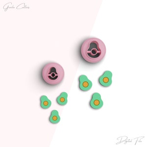 May include: Two pink avocado cookie cutters and five green avocado cookie cutters with a yellow center. The cutters are on a white and pink background. The text "Gazala Cutters" is in the top left corner of the image. The text "Digital File" is in the bottom right corner of the image.