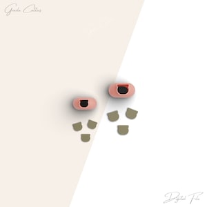 May include: Two pink silicone earbud cases with black openings and six small, light brown silicone earbud tips.