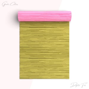 May include: A roll of gold and pink crinkle paper. The paper has a striped pattern and is rolled up with the pink side facing out.