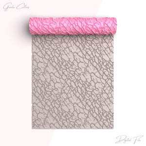 May include: A pink textured rolling pin rests atop a sheet with a cracked pattern. The sheet is a light beige color with dark gray cracks. The words "Greeda Cutters" and "Digital File" are written in cursive.