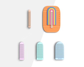 May include: An assortment of colorful, wooden craft tools. The image features a ruler, a rainbow-shaped tool, and three rectangular tools with measurements. The tools are in shades of pink, blue, and orange. The text "10 mm", "20x30", "30x30", and "40x30" is visible.