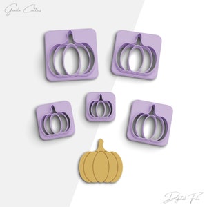 May include: Five purple plastic pumpkin cookie cutters of varying sizes, and one orange pumpkin cookie cutter.  The cookie cutters are arranged on a white background.  The text "Goodie Cutters" is in the top left corner of the image.  The text "Digital File" is in the bottom right corner of the image.