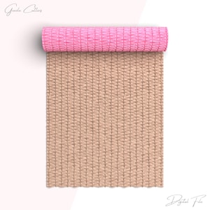 May include: A rolled-up pink yoga mat rests atop a tan woven mat. The mats are displayed on a white background. The image is a digital file.