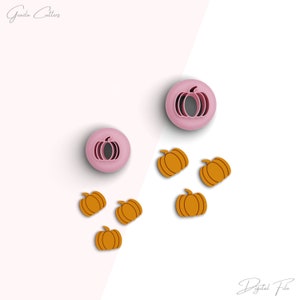 May include: Two pink pumpkin cookie cutters and six orange pumpkin cookie cutters.  The cookie cutters are on a white and pink background.  Digital File.