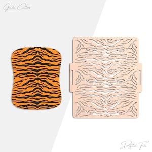 May include: An orange and black tiger stripe pattern on a curved rectangular shape, next to a light peach-colored, laser-cut envelope with a tiger stripe design. The words "Grada Cutters" and "Digital File" are in the image.