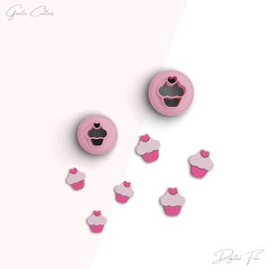 May include: Two pink cupcake cookie cutters and seven pink cupcake shapes on a white and pink background. The text "Goodie Cutters" is in the top left corner of the image. The text "Digital File" is in the bottom right corner of the image.