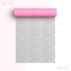 May include: A pink and gray rolling pin with a wavy pattern. The rolling pin is rolled up and the pattern is visible on the gray surface.