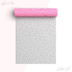 May include: A pink rolling pin with a textured surface, unrolled over a white surface with a similar pattern. The rolling pin is a vibrant pink, and the pattern is a repeating, organic design. The words "Greeda Cutters" and "Digital File" are in the image.
