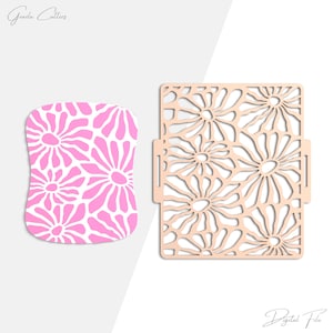 May include: Two floral-themed digital cut files. One is a pink and white daisy pattern, and the other is a beige daisy-shaped cut-out. The words "Grada Cutters" and "Digital File" are written in cursive.
