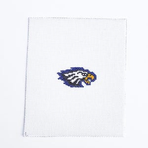 May include: A white canvas with a cross-stitch design of a blue and white eagle with a yellow beak. The eagle is centered on the canvas. The canvas has a grid-like texture.