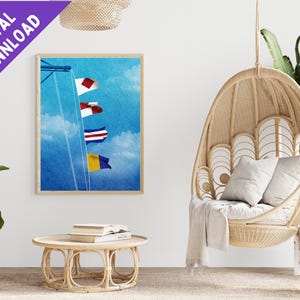 May include: A digital print of a nautical scene with four flags hanging from a mast against a blue sky with white clouds. The flags are red, white, and blue, and the print is framed in a light wood frame.
