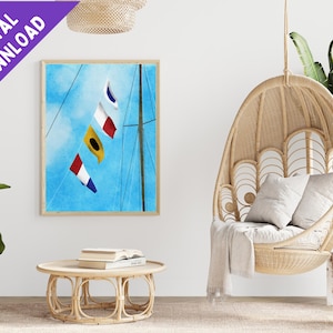 May include: A digital download of a watercolor painting of nautical signal flags hanging from a mast against a blue sky with white clouds.