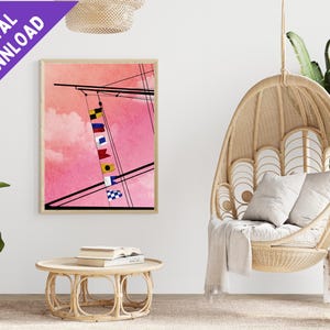 May include: A digital print of a ship's mast with colorful nautical flags against a pink and white cloudy sky.