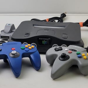 Nintendo 64 NUS-001 Console Bundle w 2 Controllers, 2 Rumble Packs, & Cables