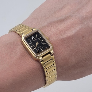 Vintage Adolfo goudkleurig quartz dameshorloge afbeelding 1