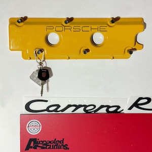 Key rack made from valve cover – original engine part