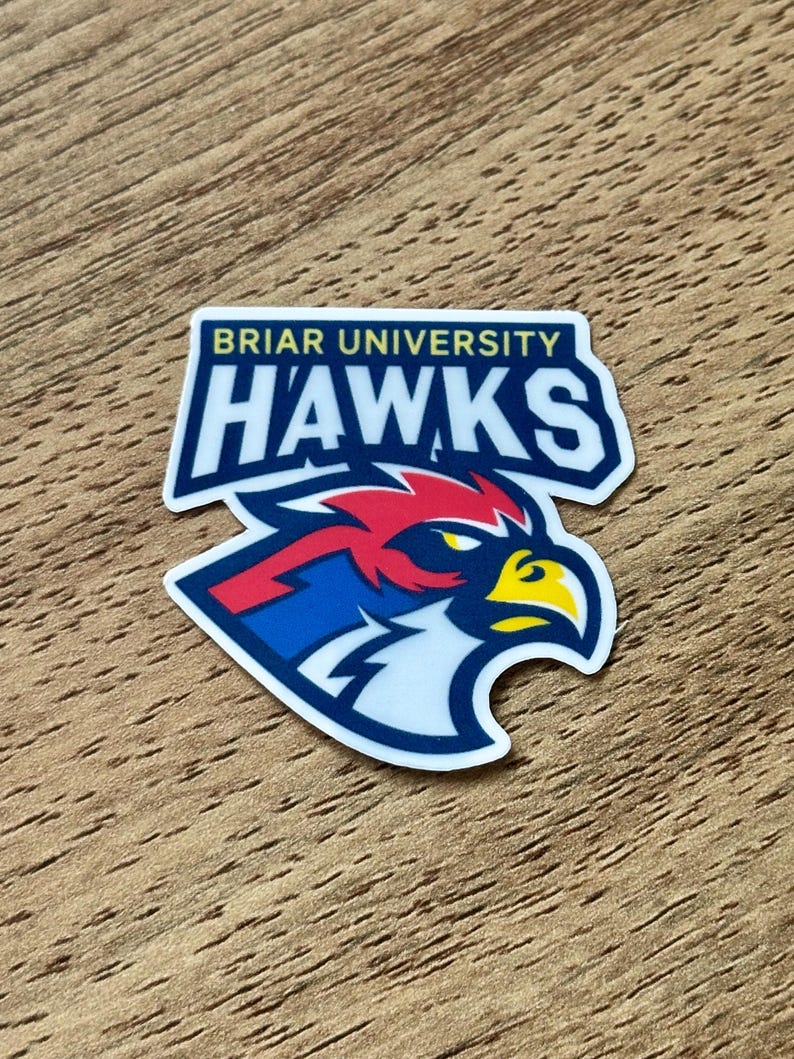 May include: A die-cut sticker featuring the Briar University Hawks logo. The design displays the text BRIAR UNIVERSITY in yellow above the word HAWKS in large white letters with a dark blue outline. A stylized hawk head in red, blue, and yellow is below.