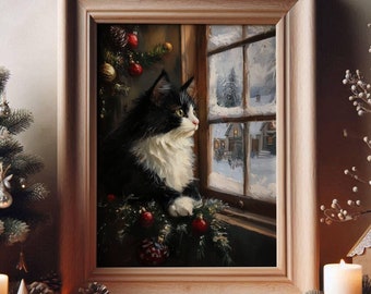 May include: A framed painting of a black and white cat gazing out a window at a snowy winter scene. The painting is decorated with Christmas ornaments and greenery, and is set on a white surface with candles and a small Christmas tree.