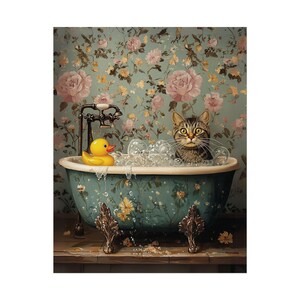 May include: A tabby cat sits in a blue and white floral bathtub with a yellow rubber ducky. The bathtub has ornate feet and is surrounded by bubbles.