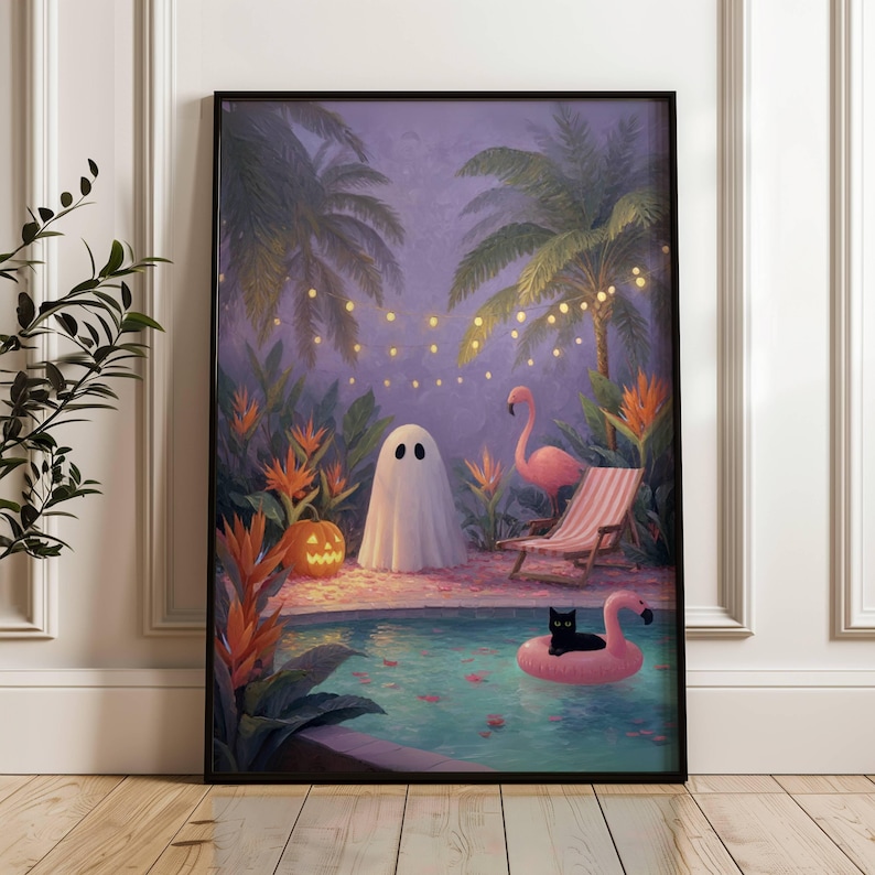 May include: Framed art print depicting a whimsical Halloween scene. A white ghost stands near a pool with a black cat on a pink flamingo float. A jack-o'-lantern and pink flamingo are also present. Palm trees and string lights create a tropical, spooky atmosphere.