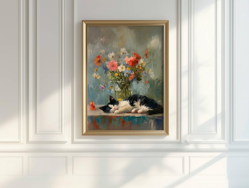 May include: A framed oil painting depicts a black and white cat sleeping on a table. A vase of colorful flowers sits behind the cat. The painting has a gold frame and is set against a light blue background.