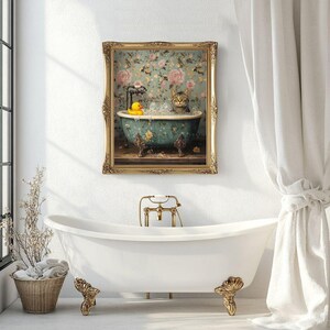 May include: A framed illustration of a cat taking a bath in a blue and white bathtub with a yellow rubber ducky. The bathtub is surrounded by floral wallpaper.