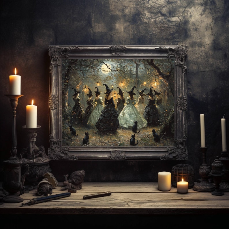 May include: A framed painting depicts a gathering of witches in a forest, surrounded by black cats. The painting is set on a wooden table with lit candles in ornate holders. The scene has a dark, gothic aesthetic.