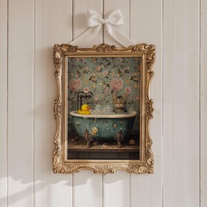 May include: A framed illustration of a cat taking a bath in a blue and white bathtub with a yellow rubber ducky. The bathtub is on a wooden surface with a floral wallpaper background.