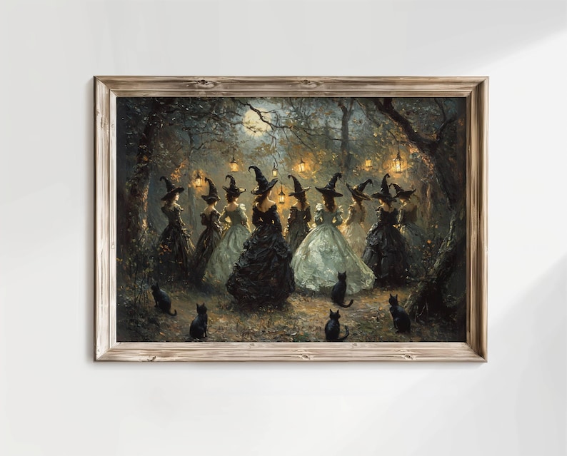 May include: A framed print depicts a gathering of witches in a moonlit forest. The witches, in elegant gowns and pointed hats, are surrounded by black cats and lanterns. The artwork has a vintage, gothic aesthetic.