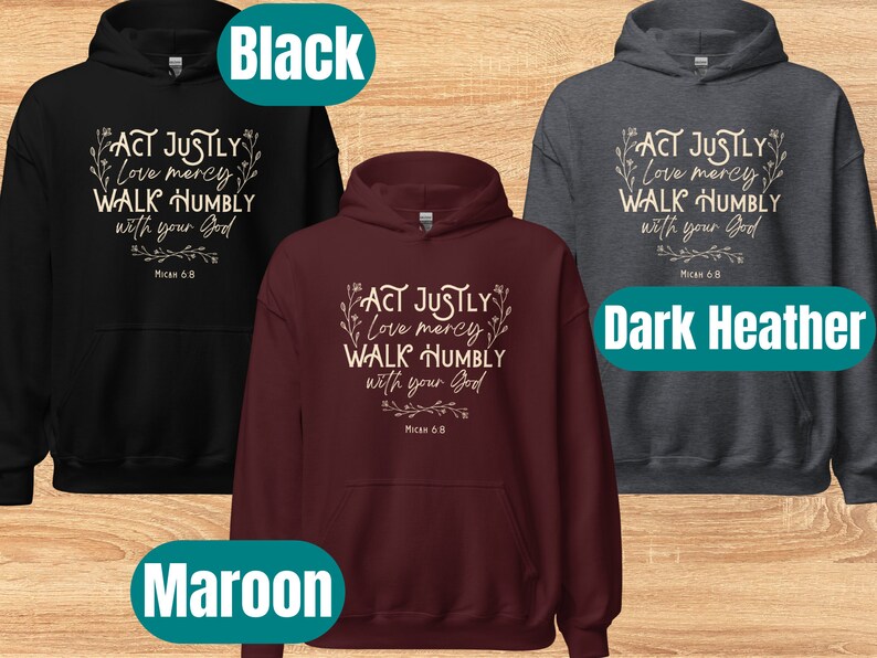 May include: Three hooded sweatshirts in black, maroon, and dark heather grey with the text "ACT JUSTLY Love mercy WALK HUMBLY with your God Micah 6:8" printed in white on the front.