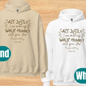 May include: Two hooded sweatshirts, one in sand and one in white, with the text "ACT JUSTLY Love mercy WALK HUMBLY with your God Micah 6.8" printed in brown on the front.