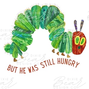 May include: A green caterpillar with a red head and yellow eyes is curled into a circle. The caterpillar has small legs and is walking on a white background. The text "BUT HE WAS STILL HUNGRY" is written in brown letters below the caterpillar.