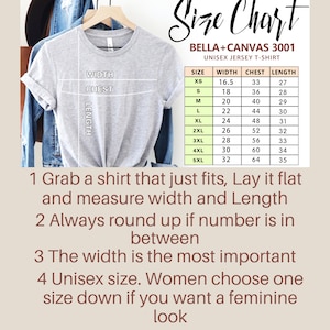 Peut inclure: Un tableau des tailles pour les t-shirts en jersey unisexe Bella + Canvas 3001. Le tableau indique les mesures de largeur, de poitrine et de longueur en pouces pour les tailles XS &agrave; 5XL.