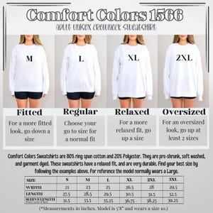 K&ouml;nnte beinhalten: Wei&szlig;es Comfort Colors Unisex-Crewneck-Sweatshirt mit den Gr&ouml;&szlig;en M, L, XL und 2XL. Das Bild enth&auml;lt Gr&ouml;&szlig;eninformationen, einschlie&szlig;lich Breite, L&auml;nge und &Auml;rmell&auml;nge in Zoll. Der Text lautet "Comfort Colors 1566 ADULT UNISEX CREWNECK SWEATSHIRT."