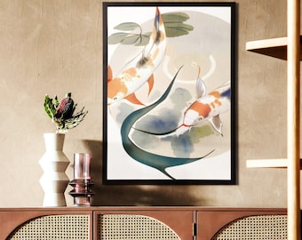 May include: Framed art print featuring two koi fish in a pond. The fish have orange, white, and black markings. The artwork includes green aquatic plants and a soft, neutral background. The frame is black.