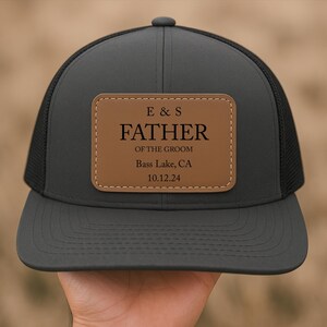 May include: Black trucker hat with a brown leather patch that says "E & S Father of the Groom Bass Lake, CA 10.12.24"