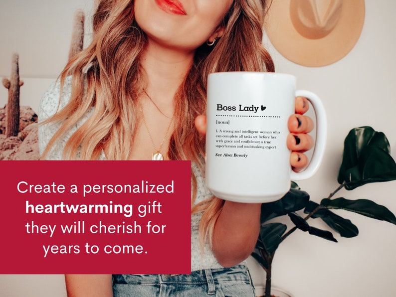 May include: A white ceramic mug featuring black printed text that reads Boss Lady, followed by the definition of a strong and intelligent person who completes tasks with grace and confidence, and the text See Also Beverly at the bottom.