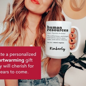 May include: White ceramic mug with a black design that reads "human resources" and a definition of the term. The mug also has the name "Kimberly" printed on it.