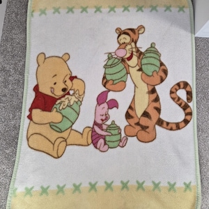 Disney Vintage Winnie the Pooh Blanket, Pre Loved Condition (Washed and Clean). Vintage Collectible (40 inch long)