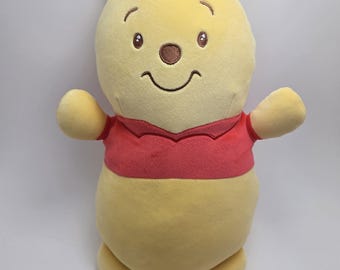 ディズニー ヴィンテージぬいぐるみ「プーさん」冬用スノースーツ着用