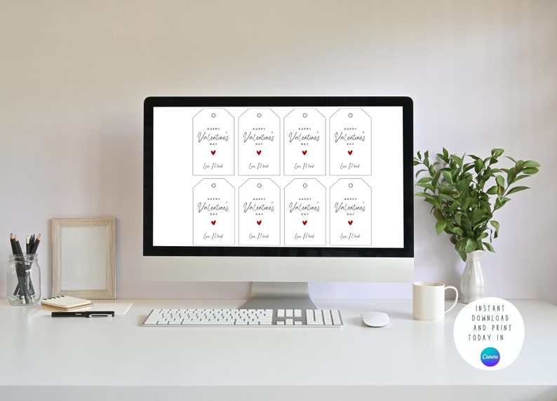 May include: A computer screen displaying eight printable Valentine's Day gift tags. Each tag features the text "Happy Valentine's Day" in cursive script with a small red heart. The tags are ready to be downloaded and printed.
