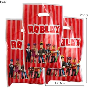 May include: A set of 10 red and white striped plastic party favor bags with a Roblox logo and characters. The bags are 25 cm tall and 16.3 cm wide.