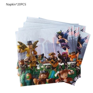 May include: A stack of 20 white paper napkins with a colorful image of cartoon characters from the Roblox video game. The image includes a group of characters playing music, a fairy, and a cityscape in the background. The text "Napkin*20PCS" is printed in the top left corner of the napkins.