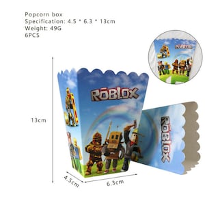 May include: Six blue and white cardboard popcorn boxes with a Roblox logo and characters. The boxes measure 4.5 inches by 6.3 inches by 13 inches.